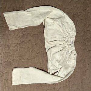 Cherokee Cream Kids Bolero Sweater w/ tulle flower detail.